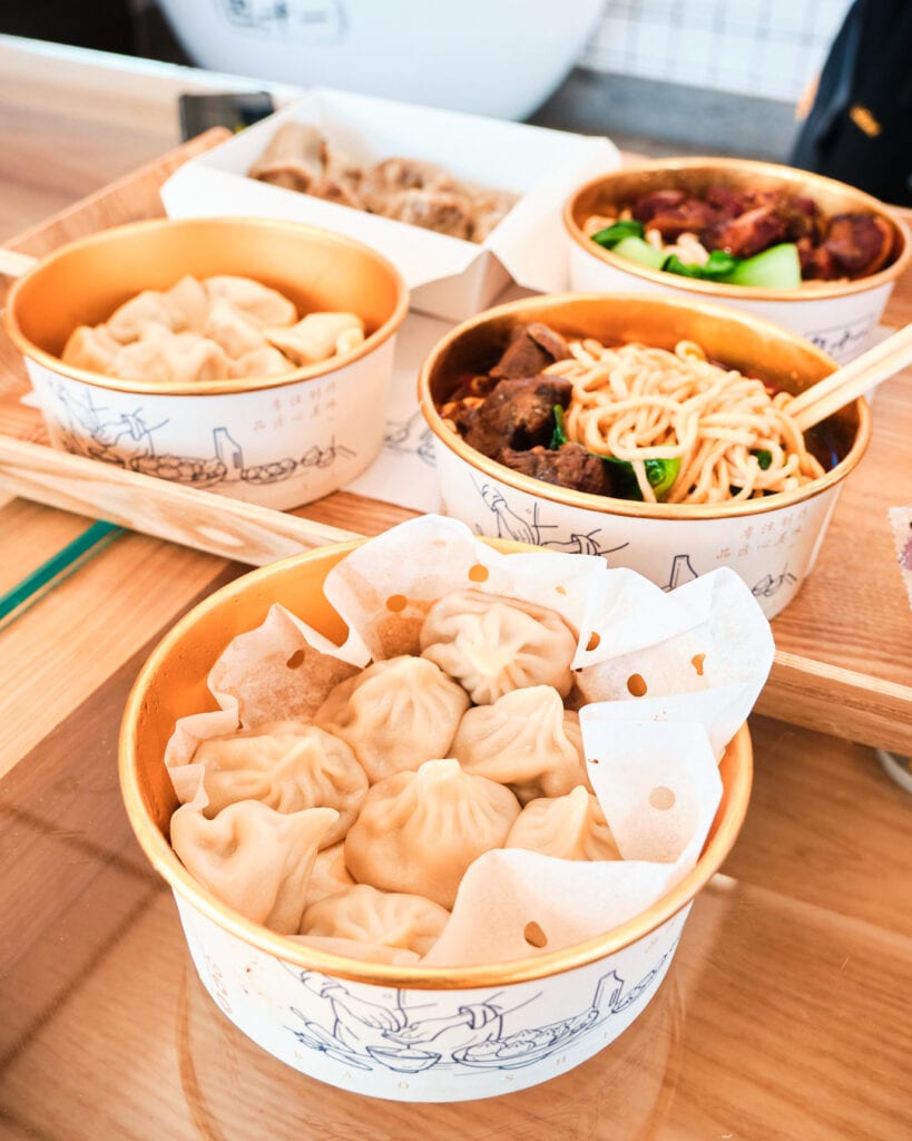 various dumplings and noodles dishes.