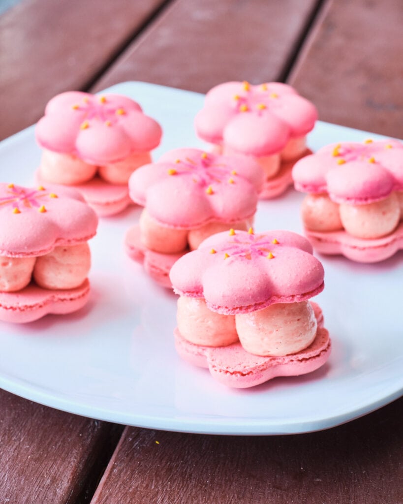 plate of pink macarons.