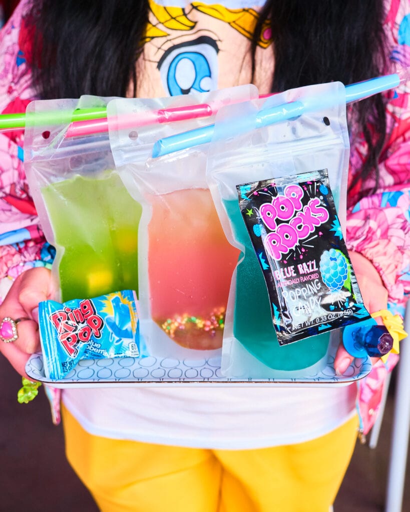 three pouches of candy drinks.