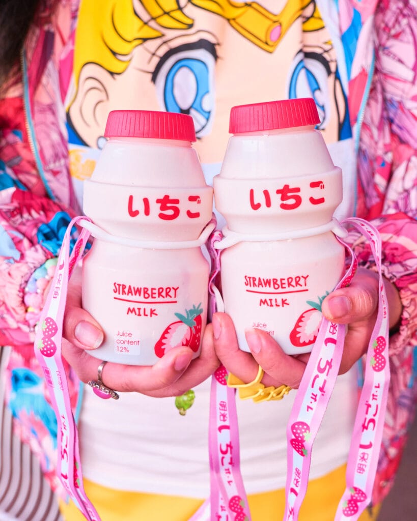two bottles of strawberry milk.