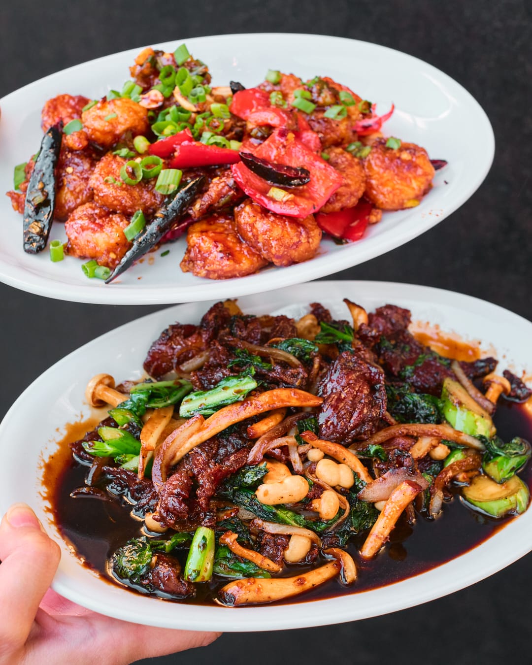 Mongolian beef and kung pao shrimp plates.