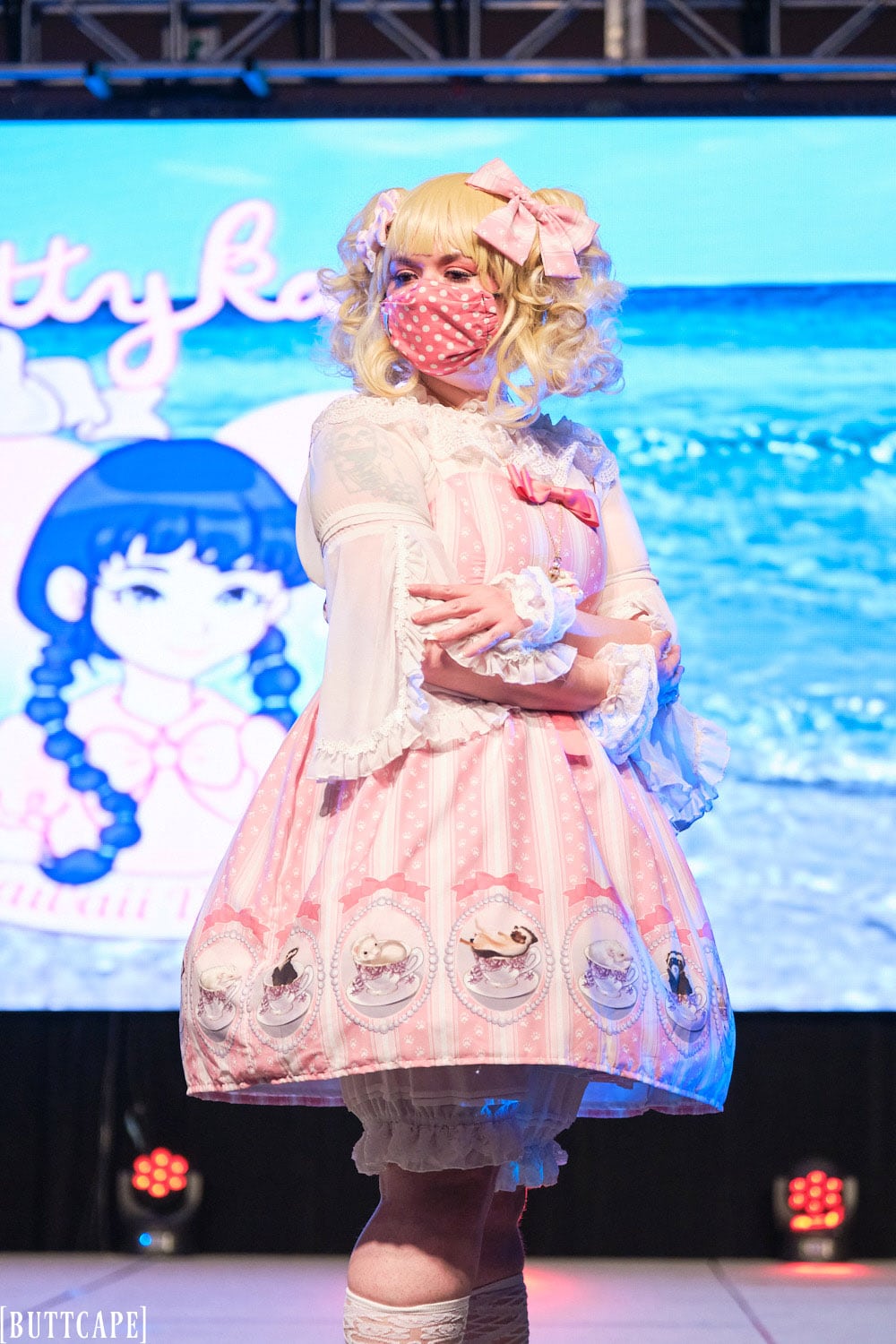 Kittykaya model 4 wearing pink lolita dress with tea cup theme and polka dot fabric - closeup 1.