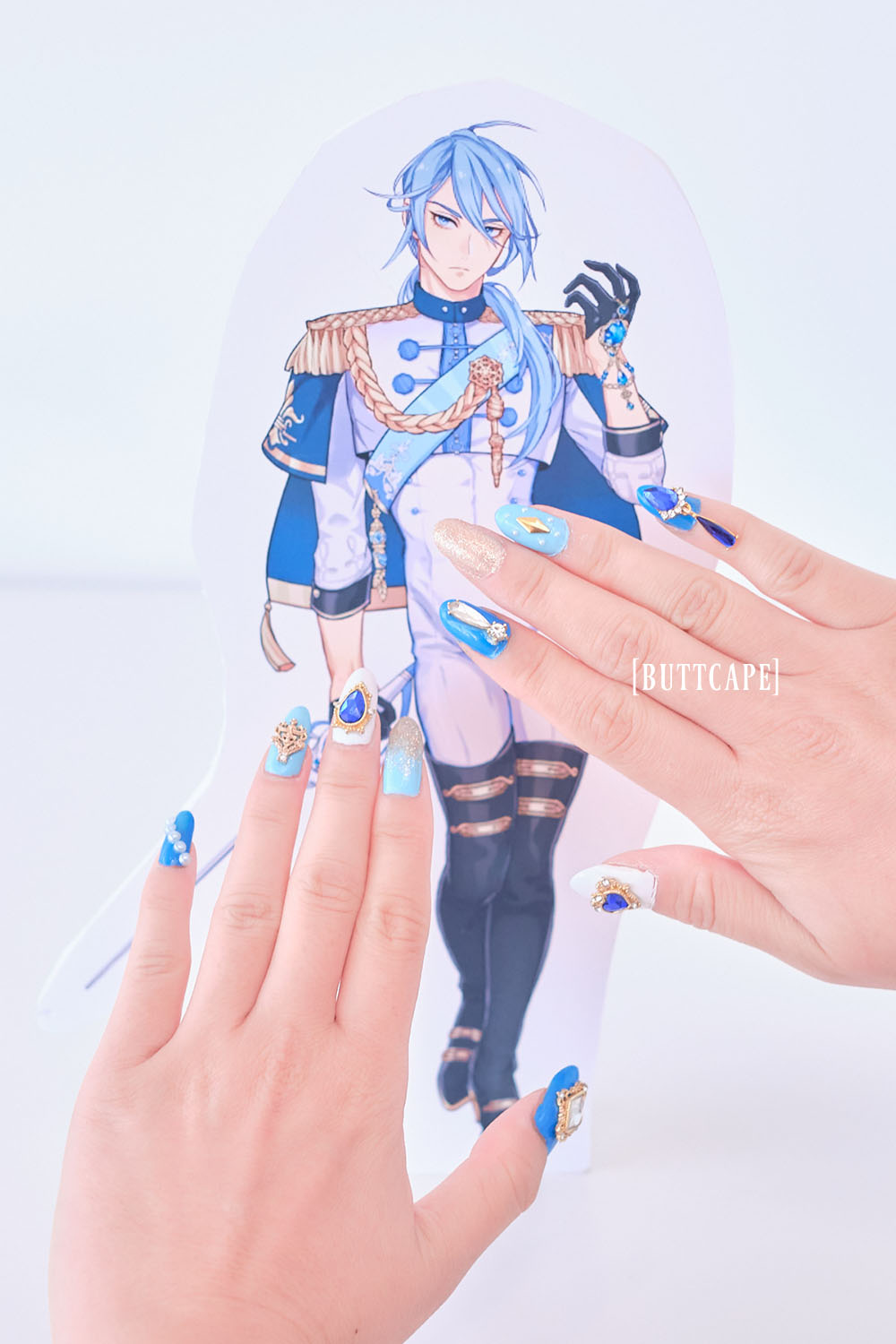 Blue, light blue, white, and gold nail set inspired by Edmond from Nu:Carnival.
