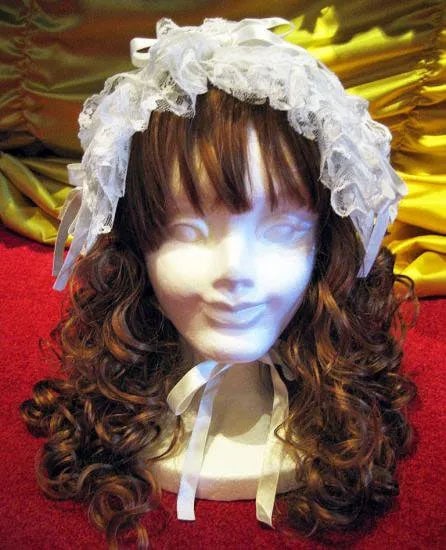 White lace headdress by Marble.