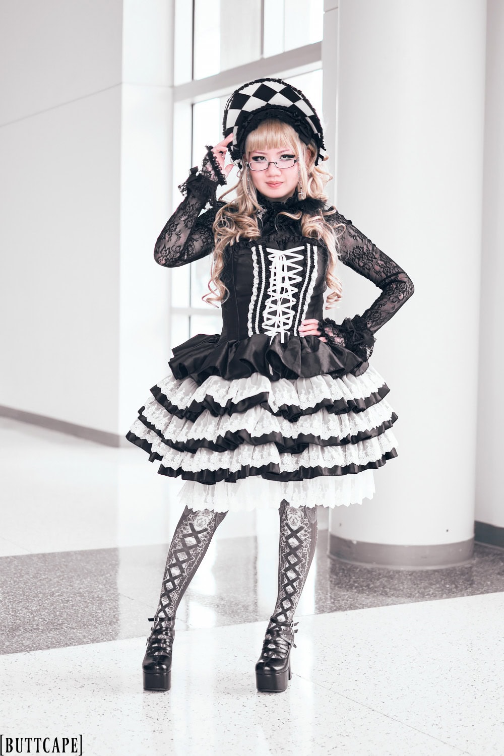 Black and white gothic lolita outfit featuring diamond bonnet, corset lace bustier dress, corset tights, and platform mary jane shoes - full body shot 2.