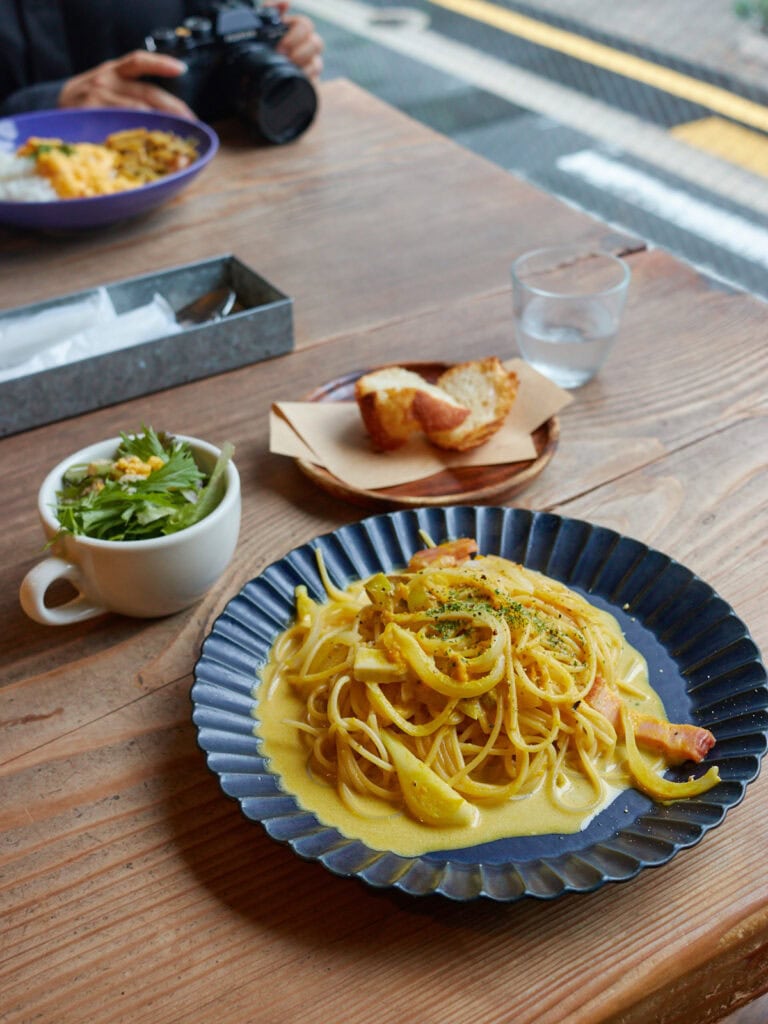 kabocha, onion, and bacon cream pasta with small side salad and bread