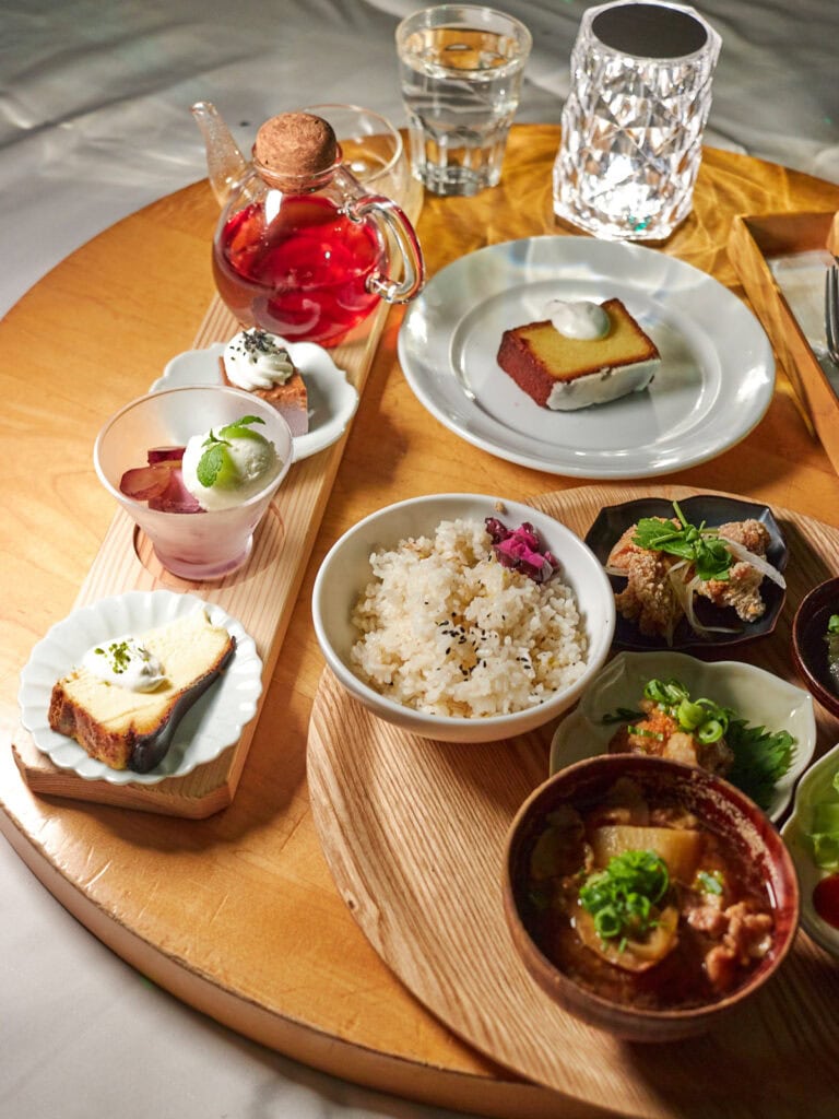 Table on cushioned floor serving 3 dessert set, setouchi lemon pound cake, and small plates dinner set