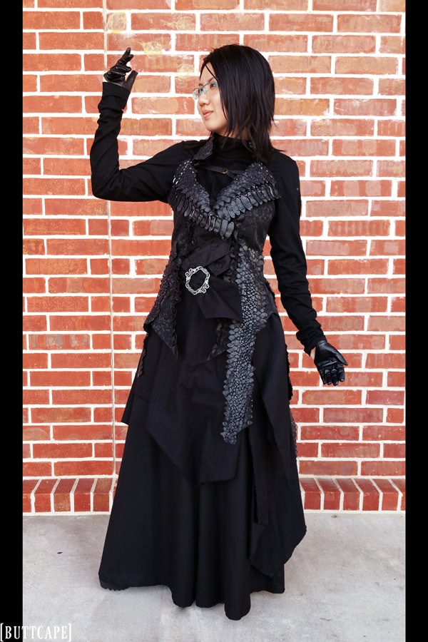 Sleek and layered gothic outfit with leather details.