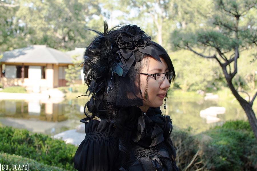 Profile shot of rose and lace hair accessories.