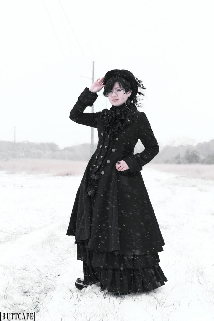 Standing in snow field looking into the distance - 2.