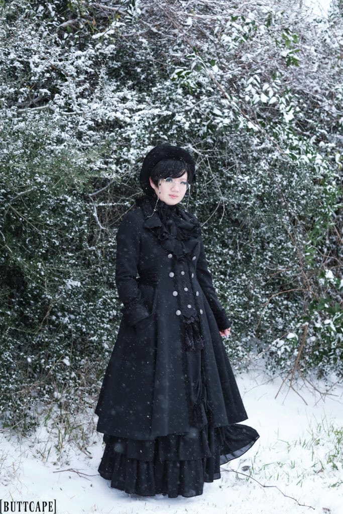 Victorian gothic person standing in snow covered thicket - 2.