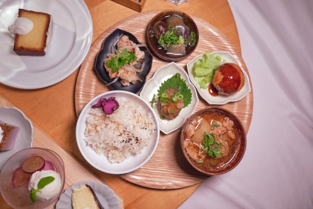 5 piece teishoku set with simmer eggplant, karaage fried chicken, hamburger steak, croquette, and tonjiru