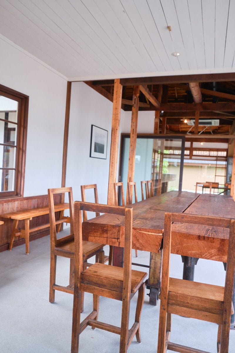 interior photo of long wooden table at hiroshima, miyajima's kakiwai