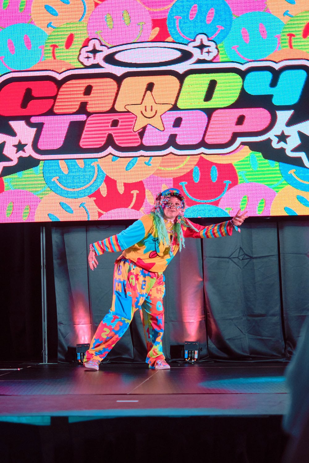 Candy Trap model #7 wears decora long sleeve t-shirt and spatter baggy pants.