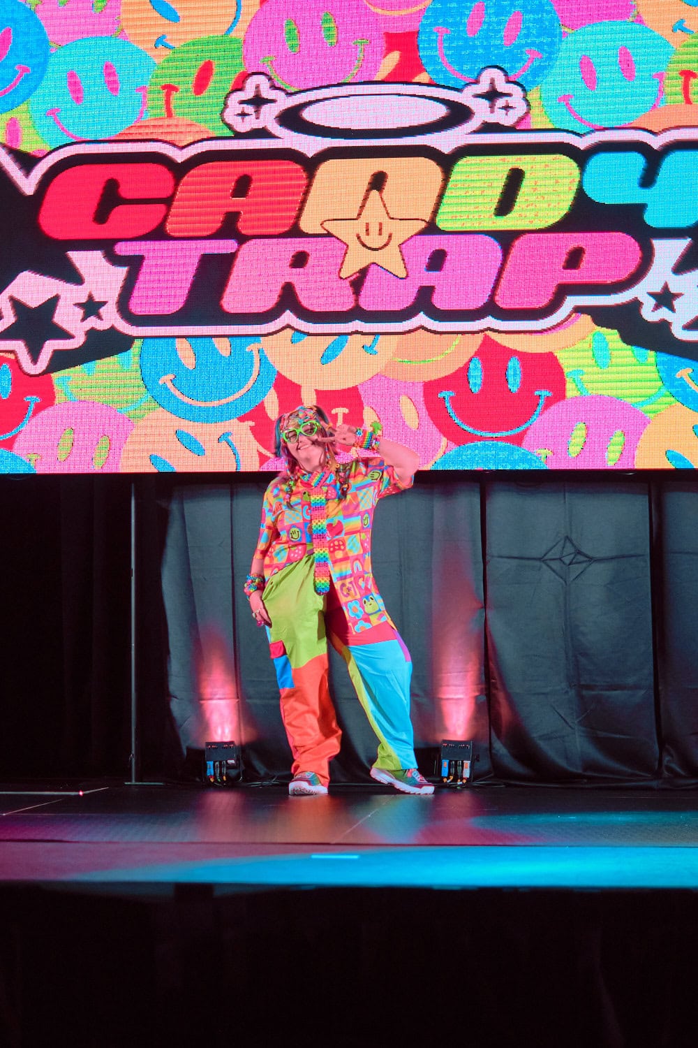 Candy Trap model #8 wears decora short sleeve button up and geometric blocked baggy pants.
