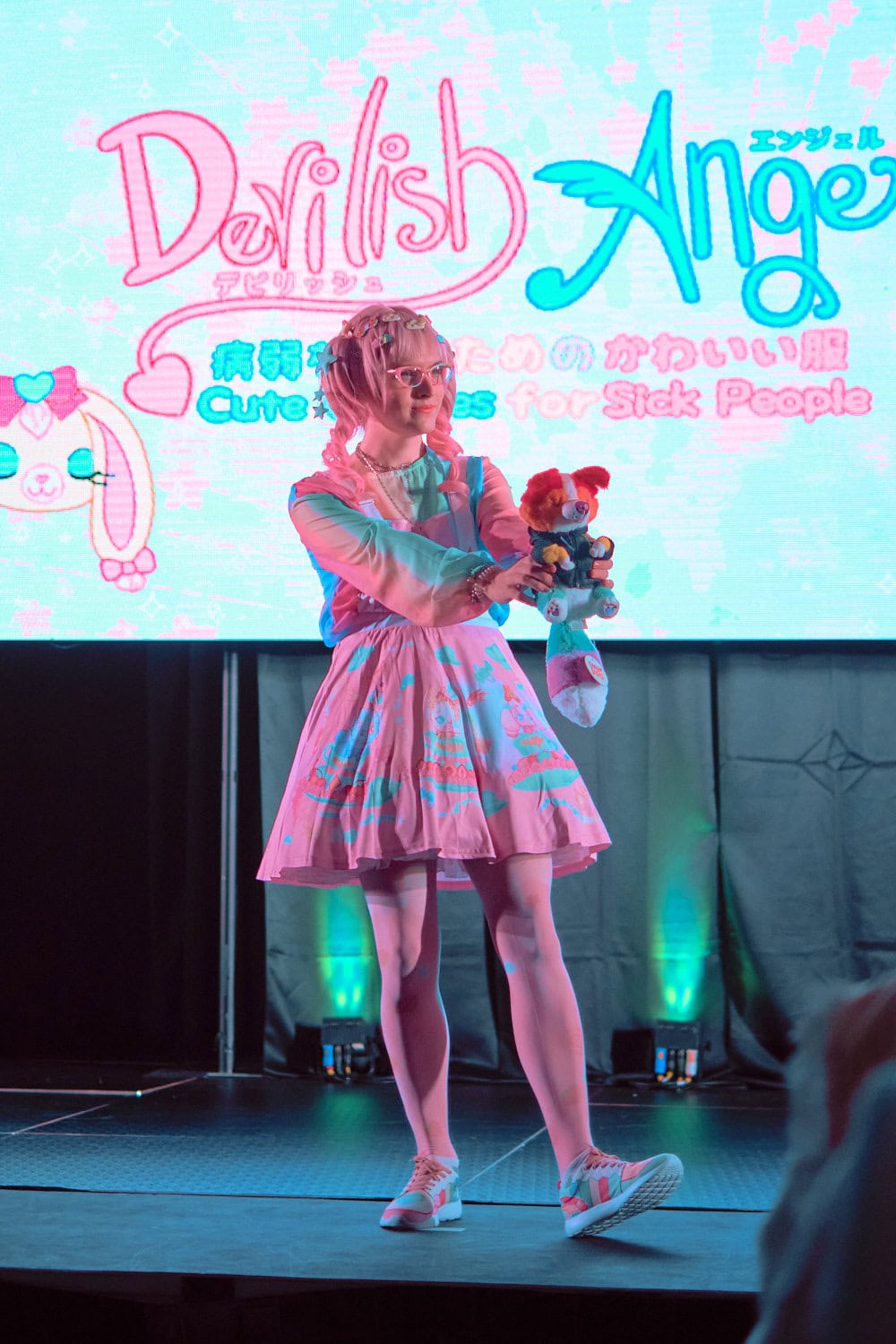 Devilish Angel model #1 wearing pink and sax themed sweet lolita.