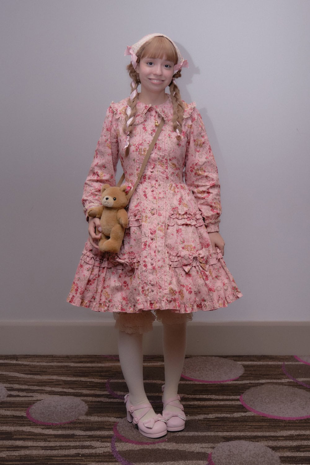 Classic lolita wearing pink floral dress.