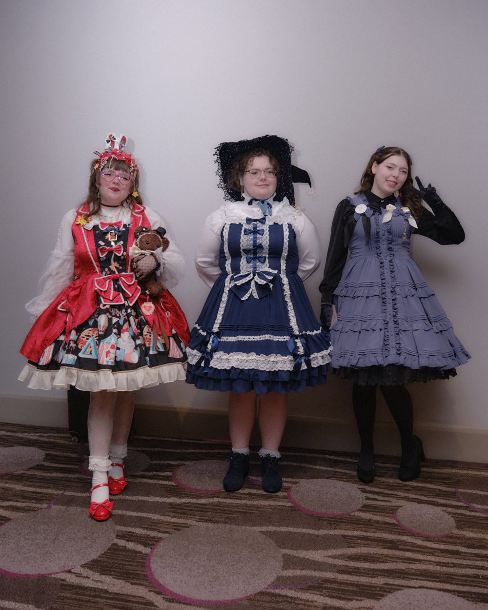 Three lolitas standing together.