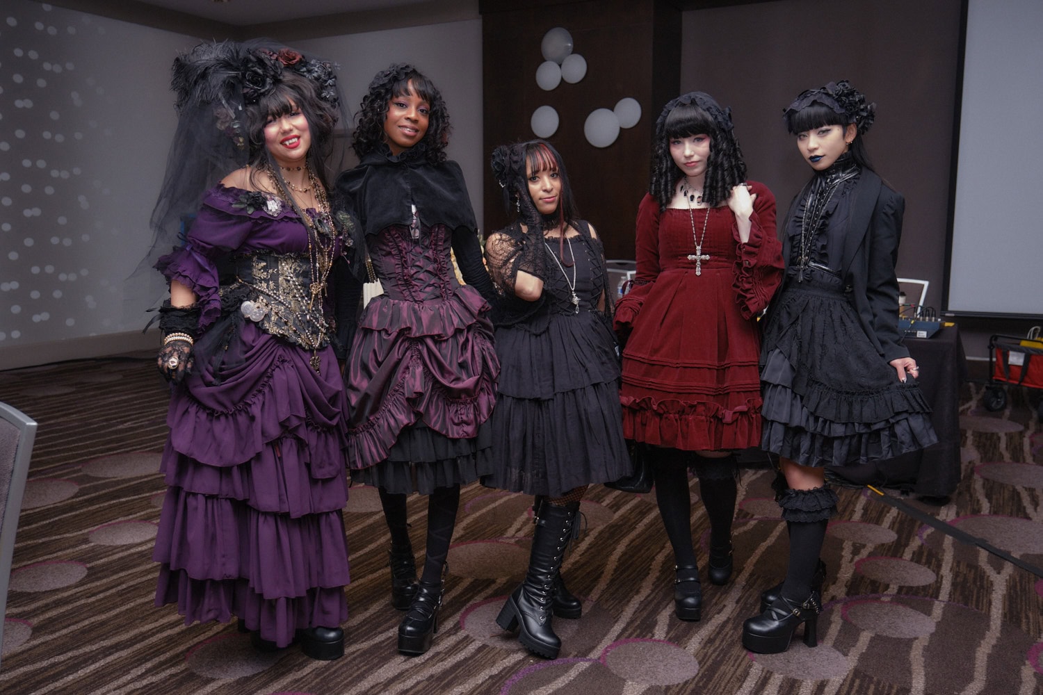 Group of 5 gothic lolitas.