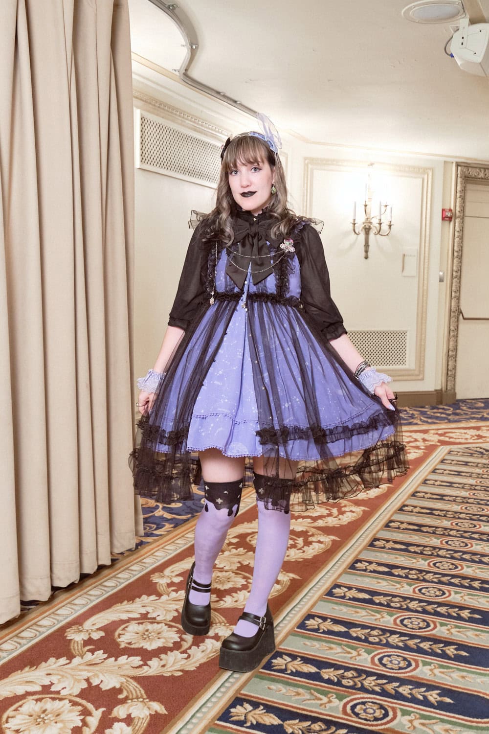 Sweet lolita wearing lavender and black Angelic Pretty outfit.