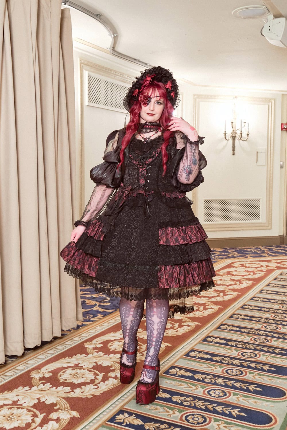 Gothic lolita wearing black and red jacquard dress by Alice and the Pirates.