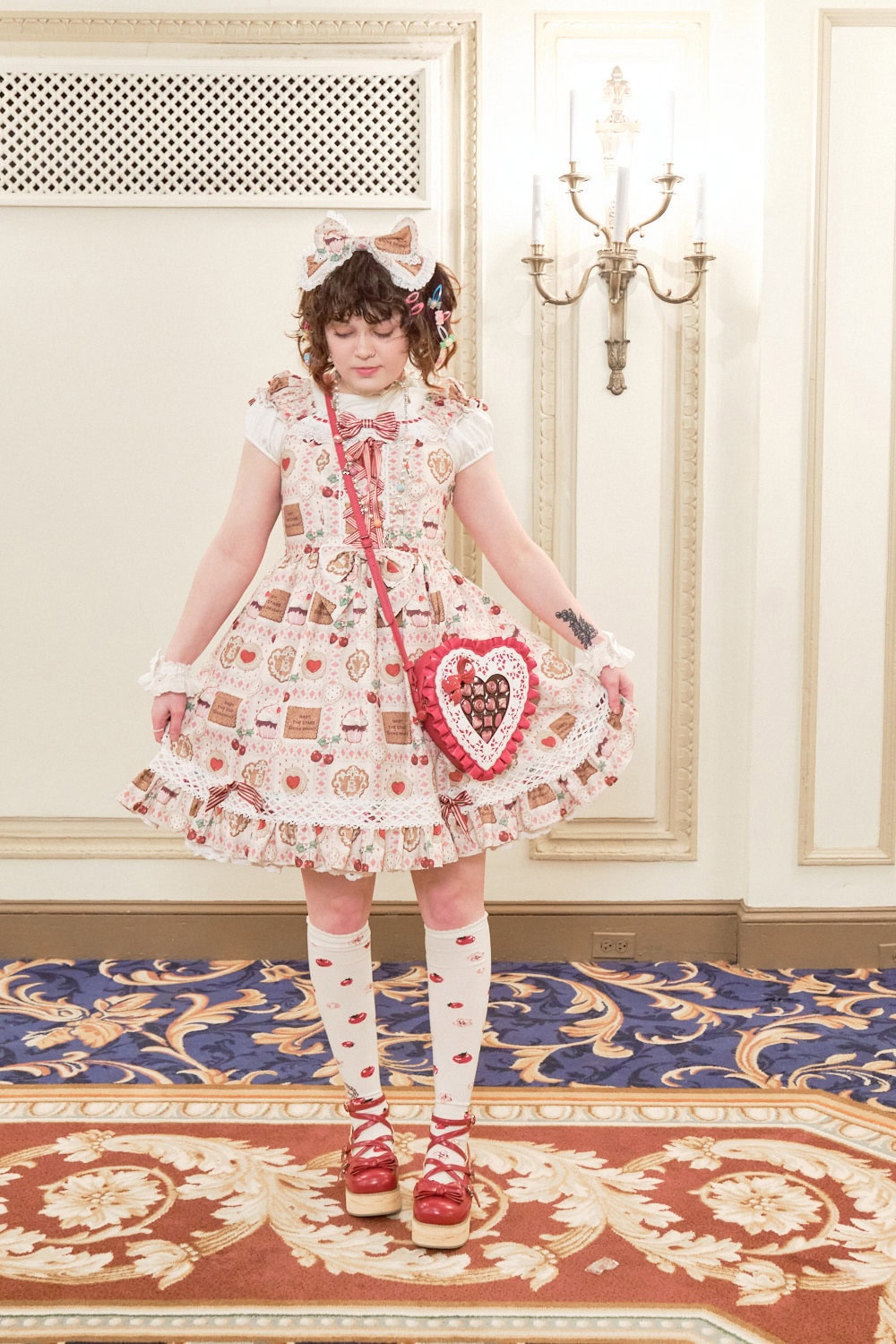 Sweet lolita wearing a cookies and biscuit print dress by Angelic Pretty.
