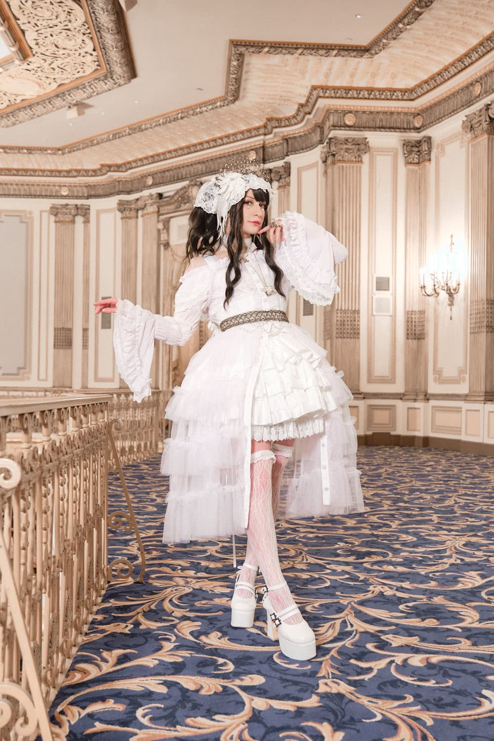 Connie from Atelier Pierrot wearing all white outfit featuring sheer tulle peignor, mini length corset dress, princess sleeve blouse, and lace accessories.