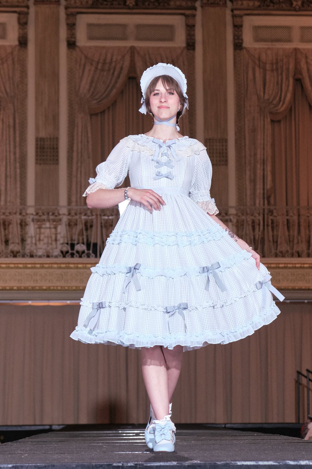 Model 6 wearing sax and white gingham sweet lolita by Melody Basket.