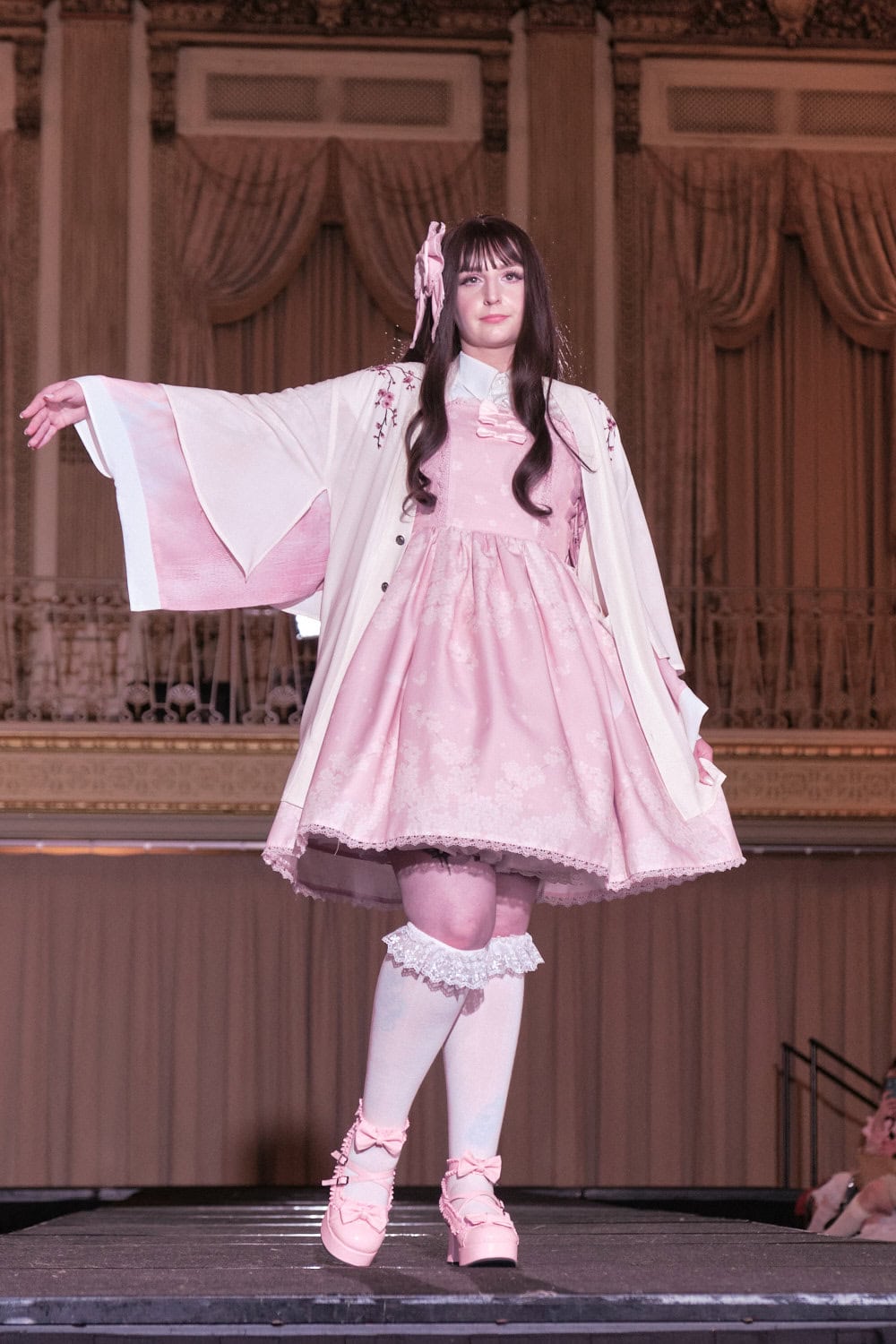 Model 16 wearing pink cherry blossom dress with matching pink haori jacket by Axes Femme Kawaii.