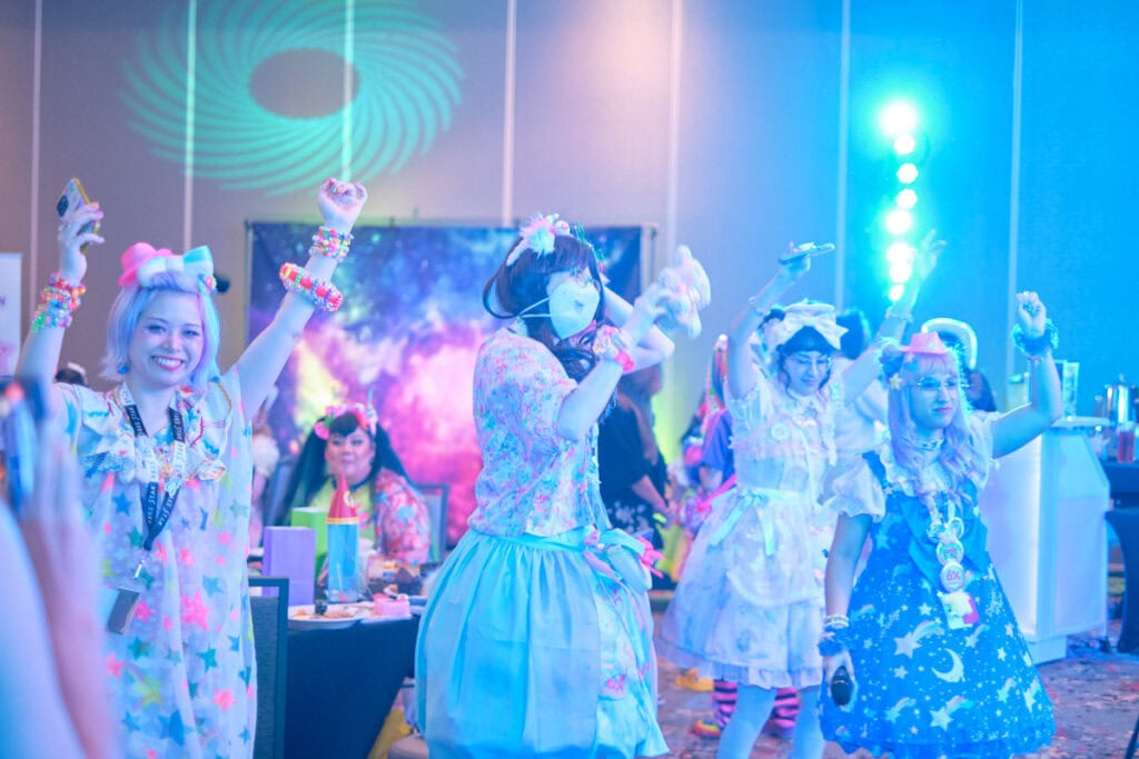 Attendees dancing.