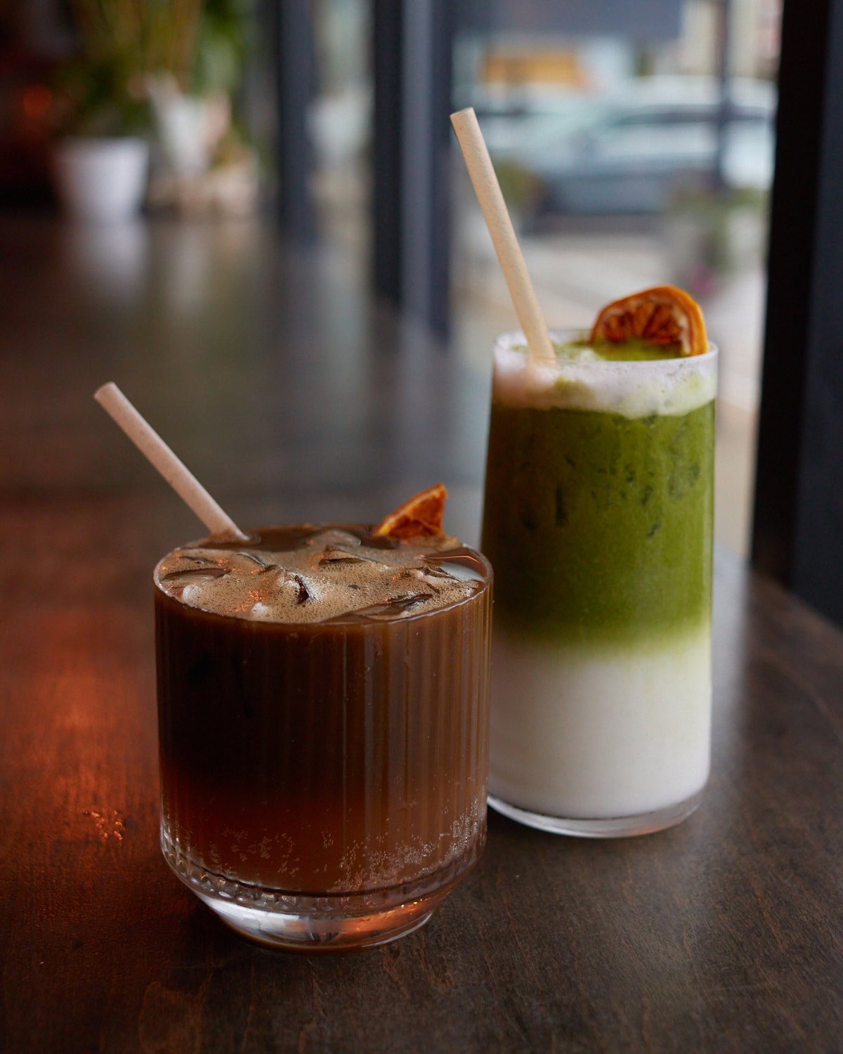 third place houjicha cowboy drink and matcha latte on a brown table top