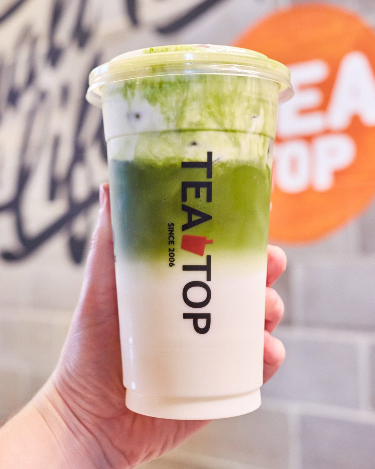 tea top matcha latte with cheese foam topping