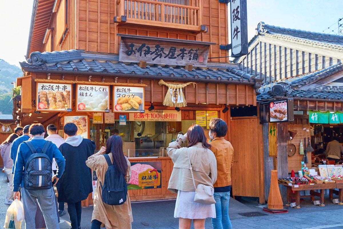 Street food store front featuring Matsusaka beef kushikatsu, Matsusaka beef nikuman, and Matsusaka beef croquettes