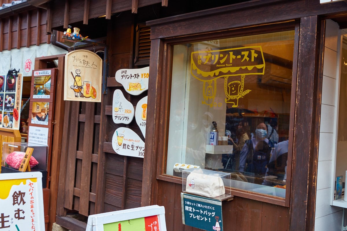 Pudding Toast store front with menu and characters