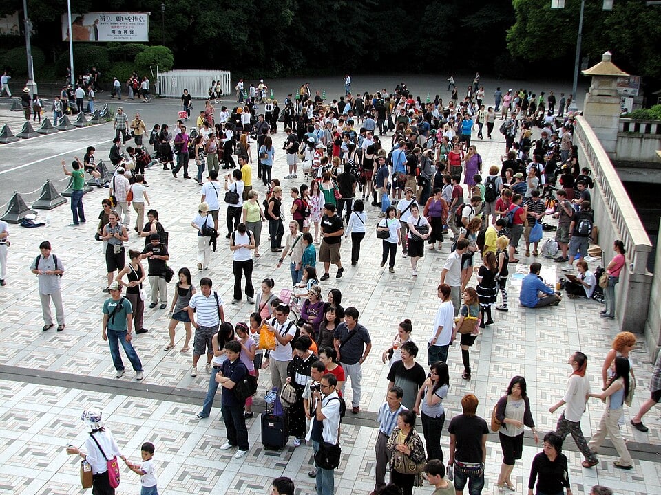Jingubashi bridge in Harajuku with a lot of tourists walking around.