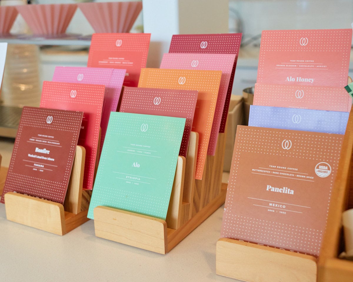 BlendIn Coffee clubs free standing coffee bean cards with single origin options on them.