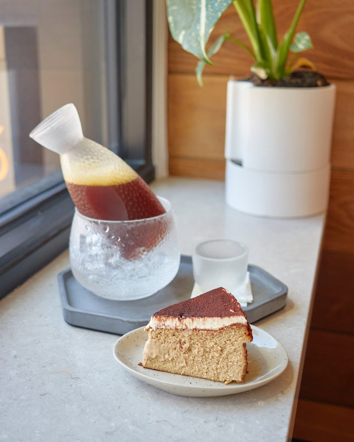 Japanese style iced coffee in a choko with a basque cheesecake from simply coffie